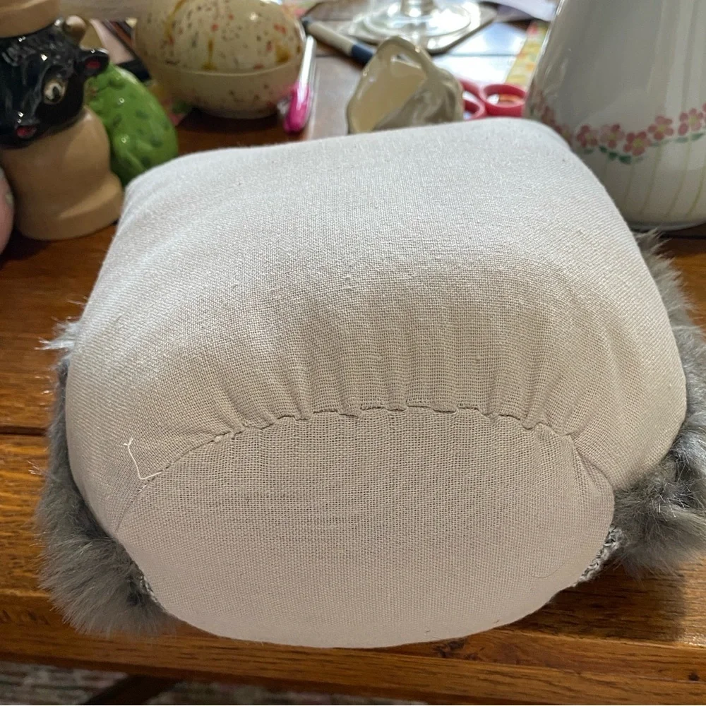 This is an Elements Weighted Fabric Owl Door Stopper. NWOT. 9 inches tall.